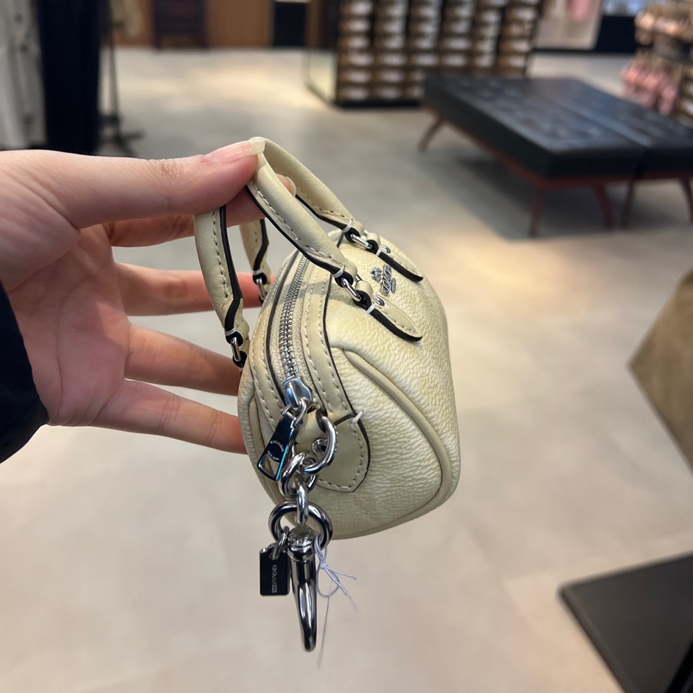NWT COACH Mini Rowan Bag Charm Signature Canvas CX068 Silver /Hay - Picture 2 of 4